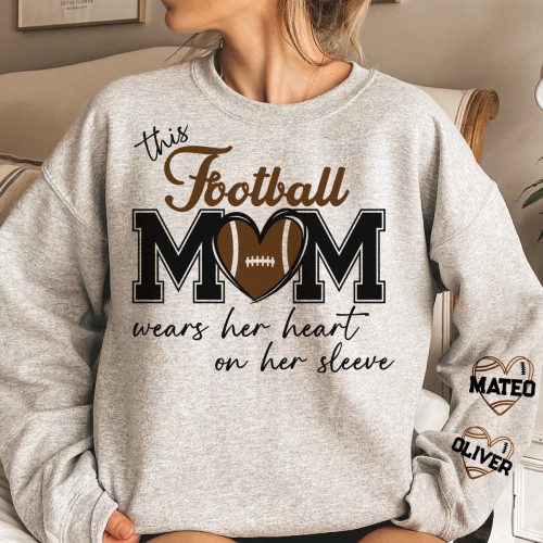 This-Football-Mom-Wears-Her-Heart-On-Her-Sleeve-Personalized-Sweatshirt_1.jpg